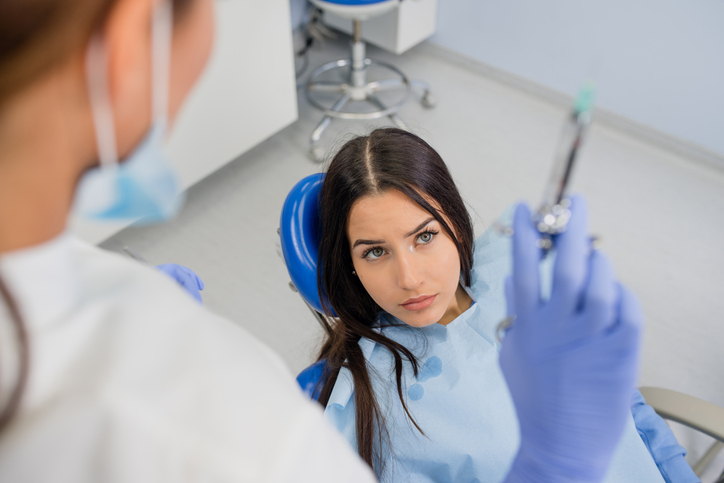 Terrified patient at dentist office